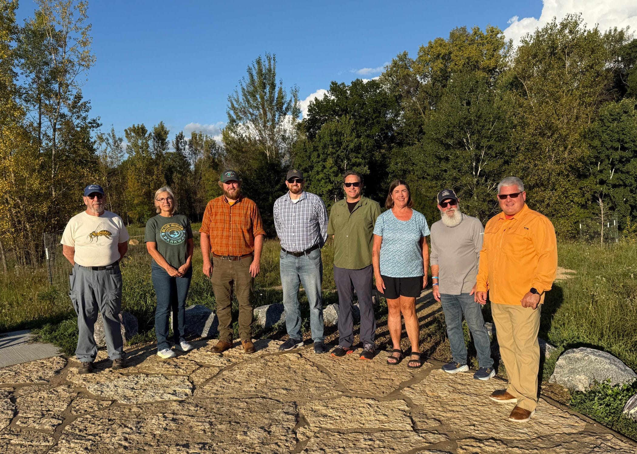CAC committee members standing in a row